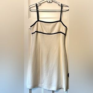 White with black trim dress from Petite Sophisticated size 4